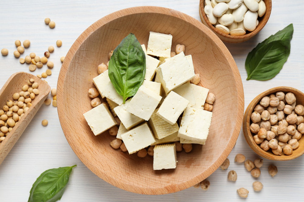 Tofu and soybeans in wooden bowls.