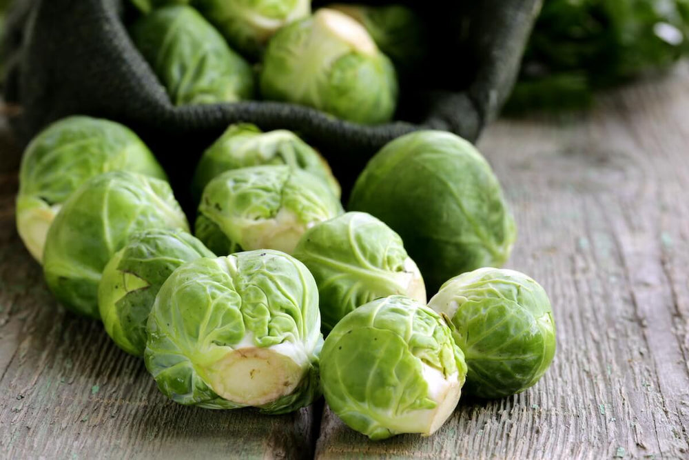 Can dogs eat brussel sprouts: brussel sprouts on a wooden table