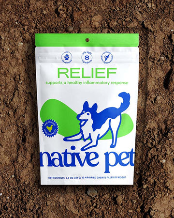 A pouch of Native Pet Relief Chews on a dirt background